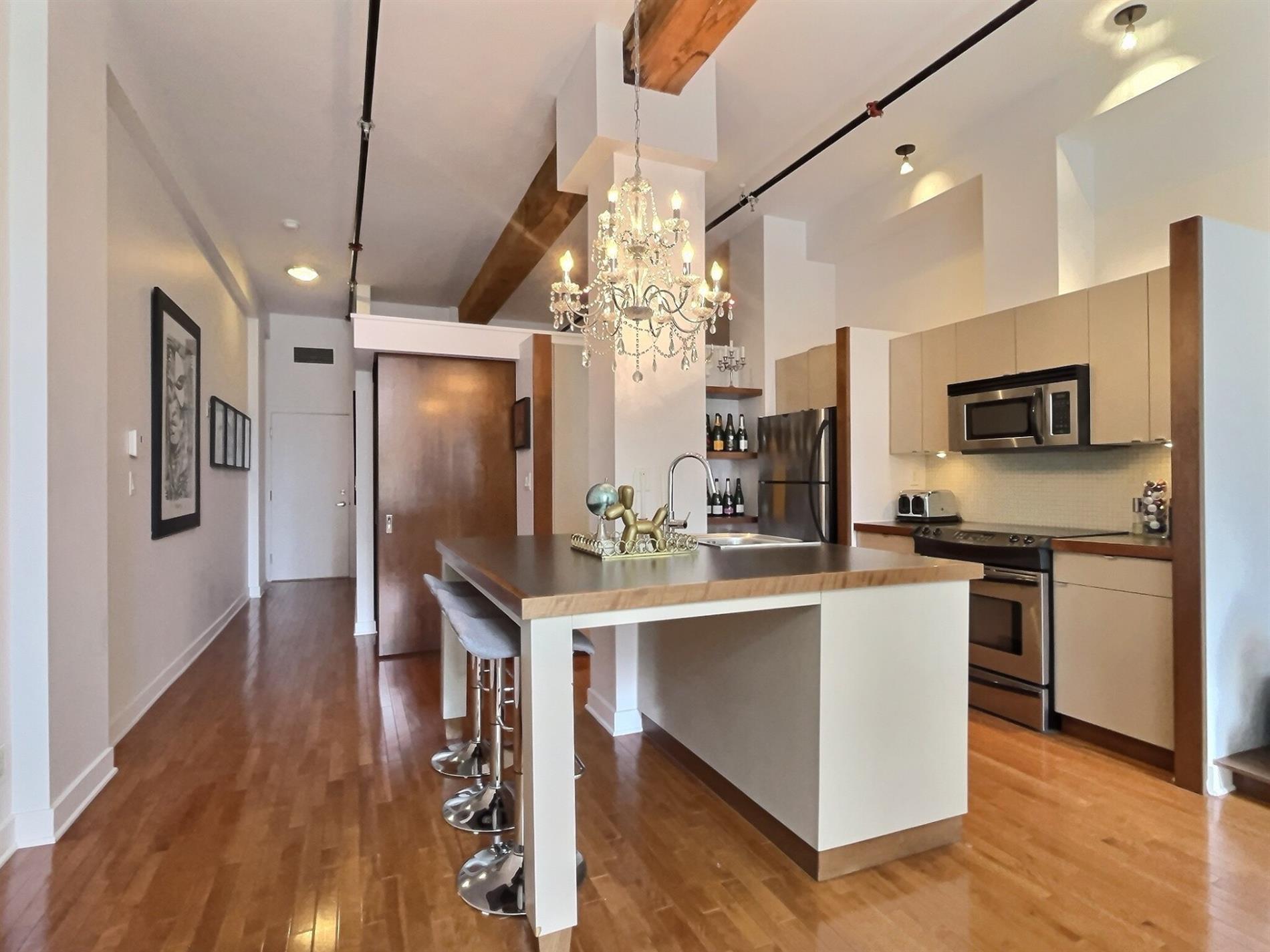 1015 Rue William — photo 1